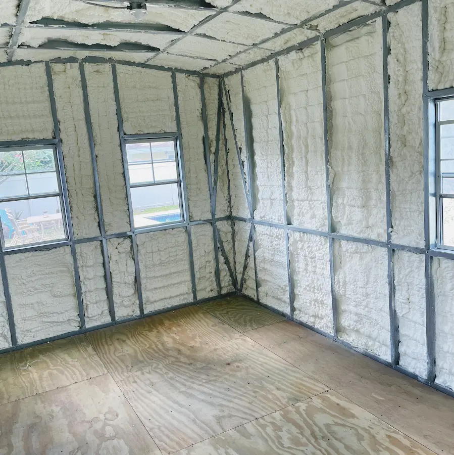 Closed-cell spray foam insulation applied to wall cavities in a residential project in Juneau